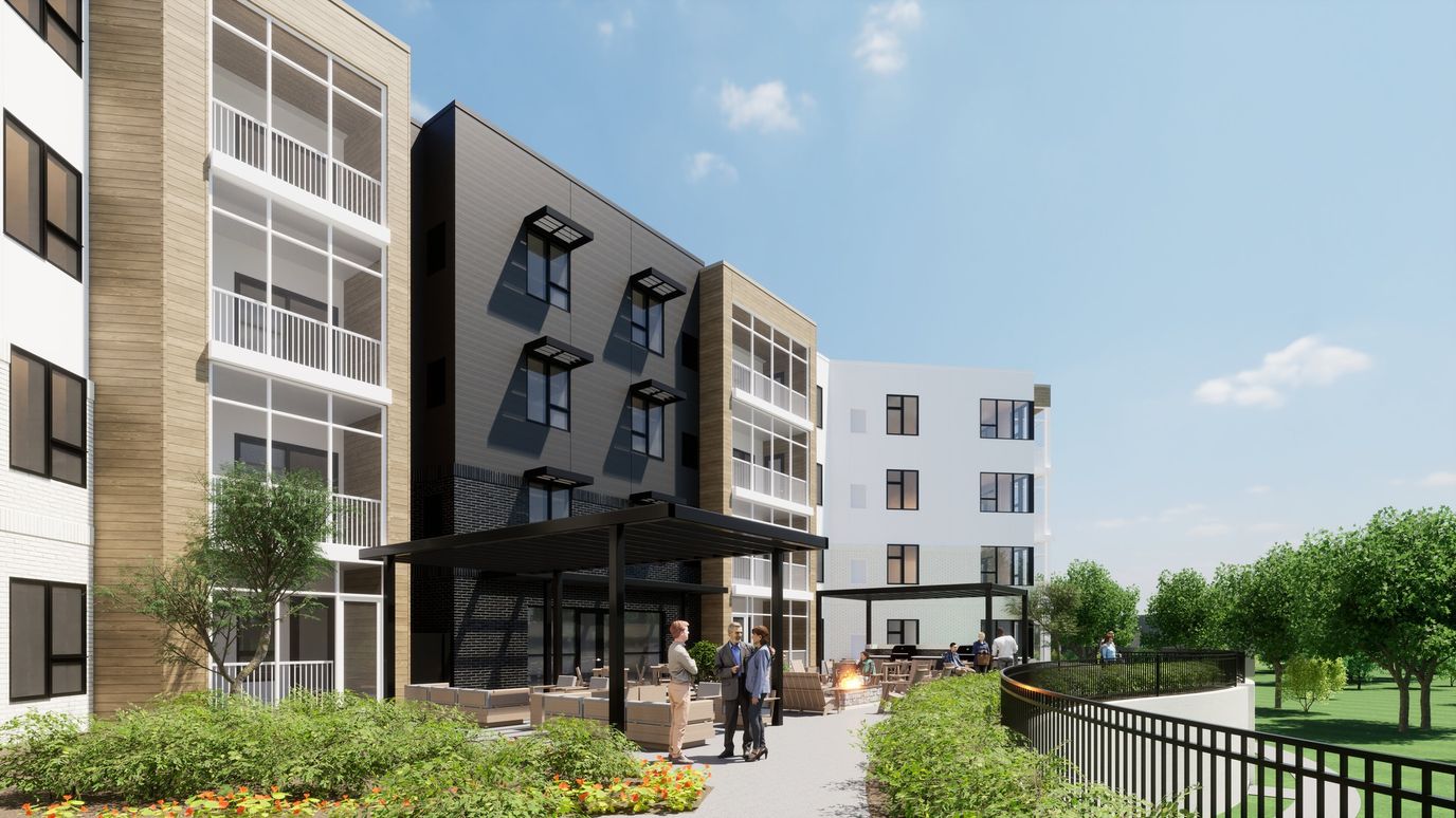 Residents socializing in an outdoor area with seating