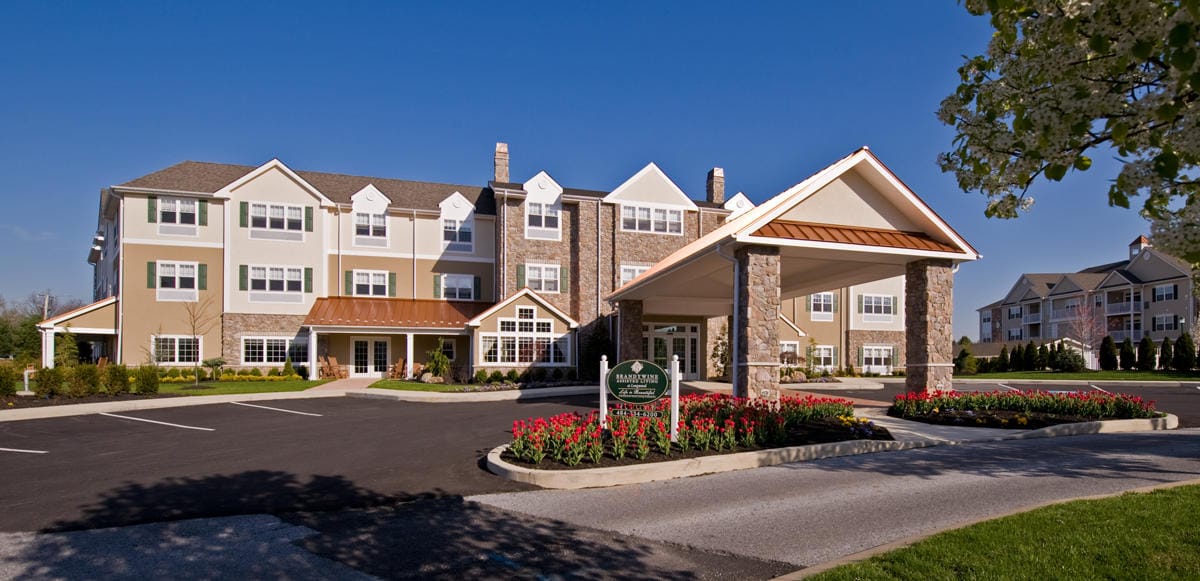 Exterior view of Brandywine Longwood facility with landscaped entrance