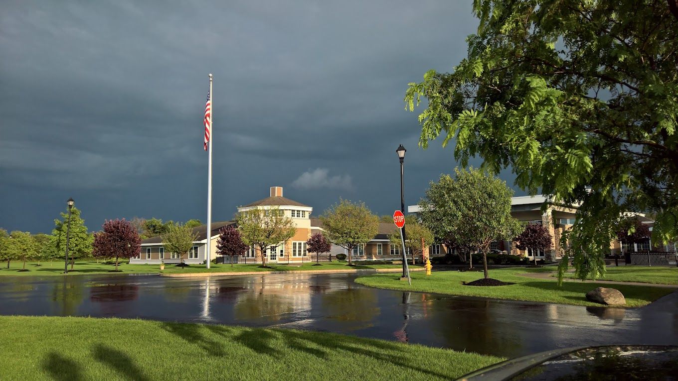 Exterior view of the facility with green landscaping