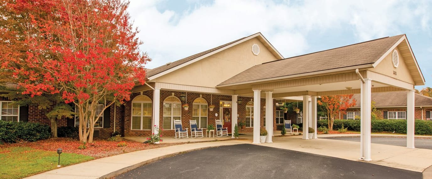 Exterior view of Brookdale Burlington with colorful foliage