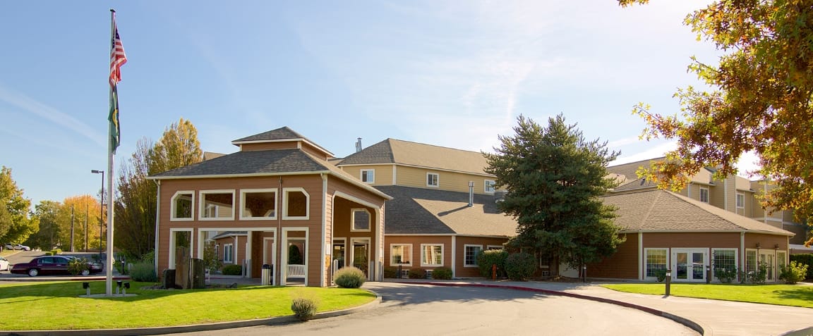 Exterior view of Brookdale Richland facility with garden
