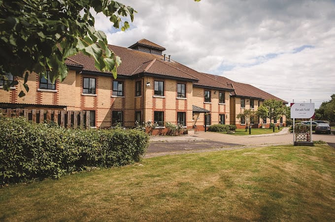 Exterior view of Brookfield Care Home with landscaping