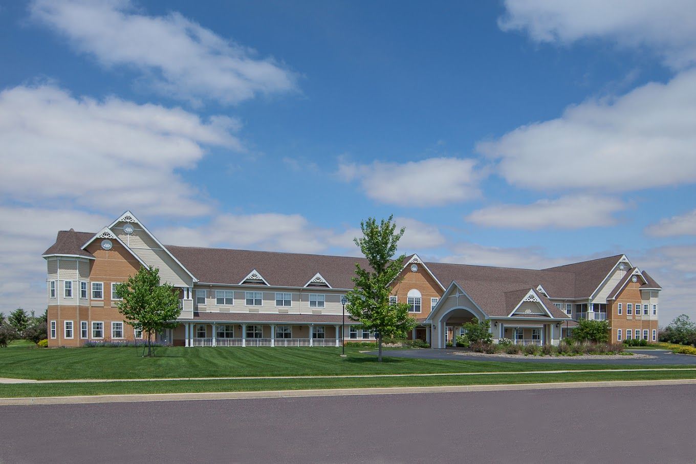 Exterior view of Charter Senior Living facility on a sunny day