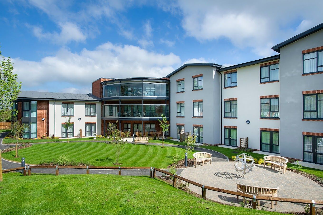 Exterior view of Chawley Grove facility with landscaped garden