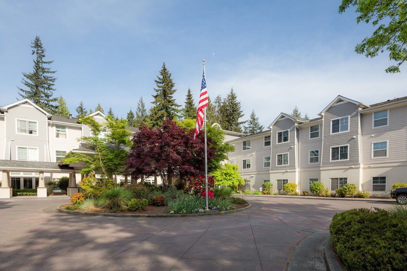 Exterior view of Cogir of Mill Creek with landscaping
