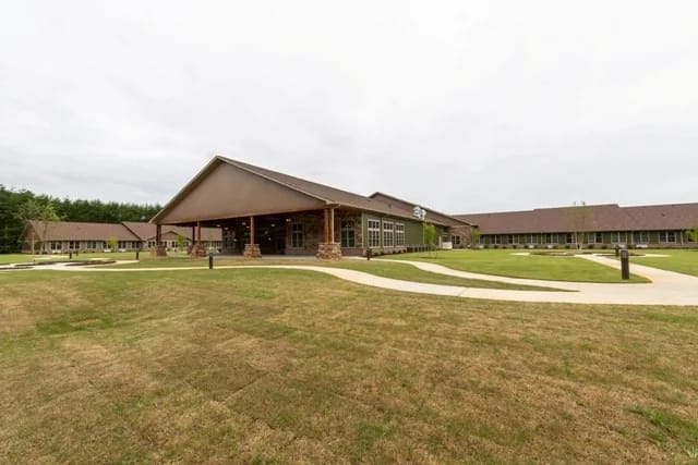 Exterior view of Laurel Lodge with landscaped grounds