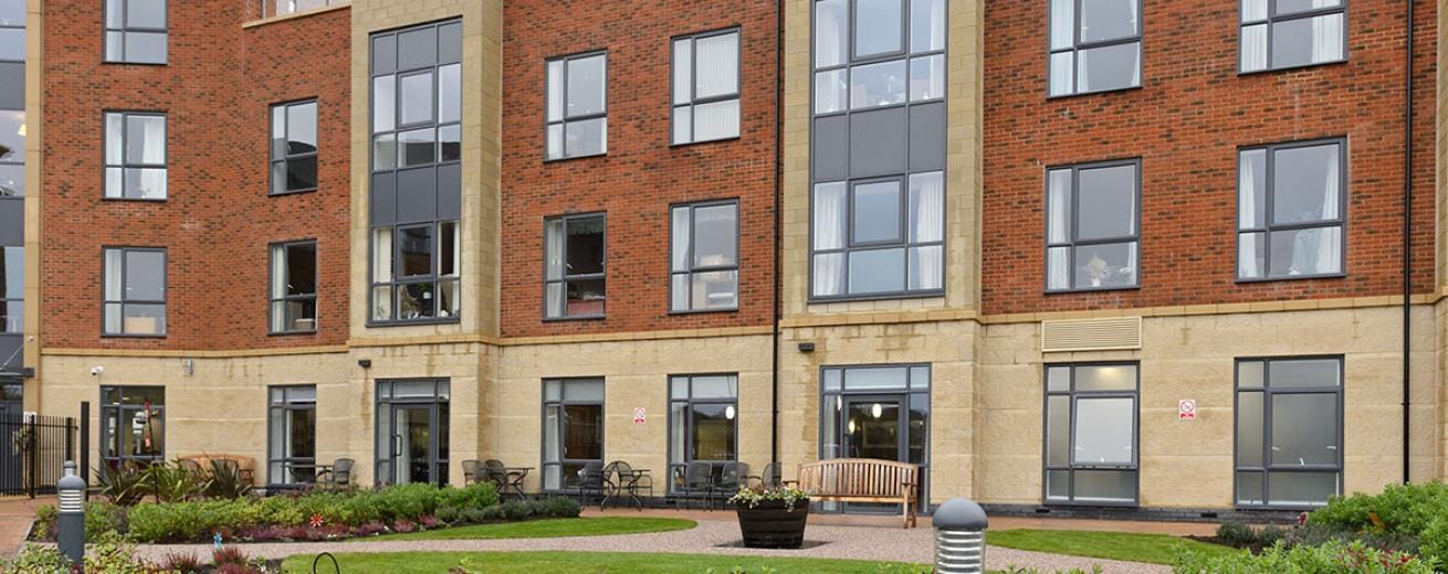 Exterior view of Lawley Bank Court with garden
