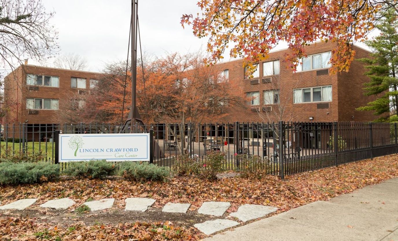 Exterior view of Lincoln Crawford Care Center with landscaped area