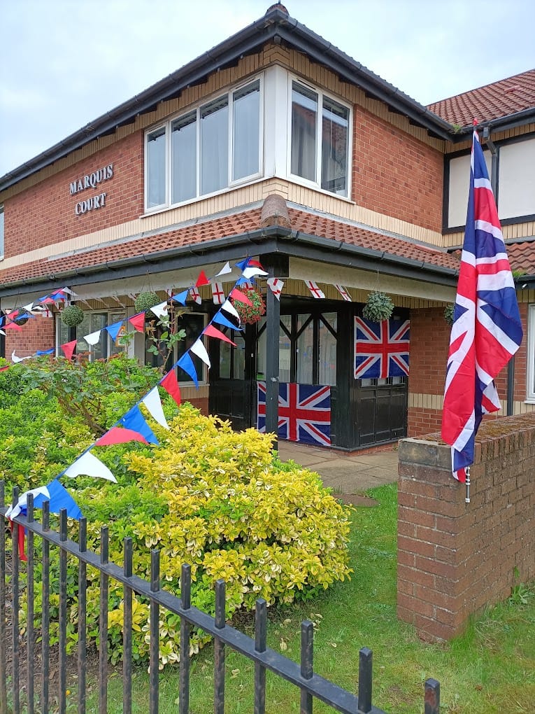 Exterior of Marquis Court with festive decorations