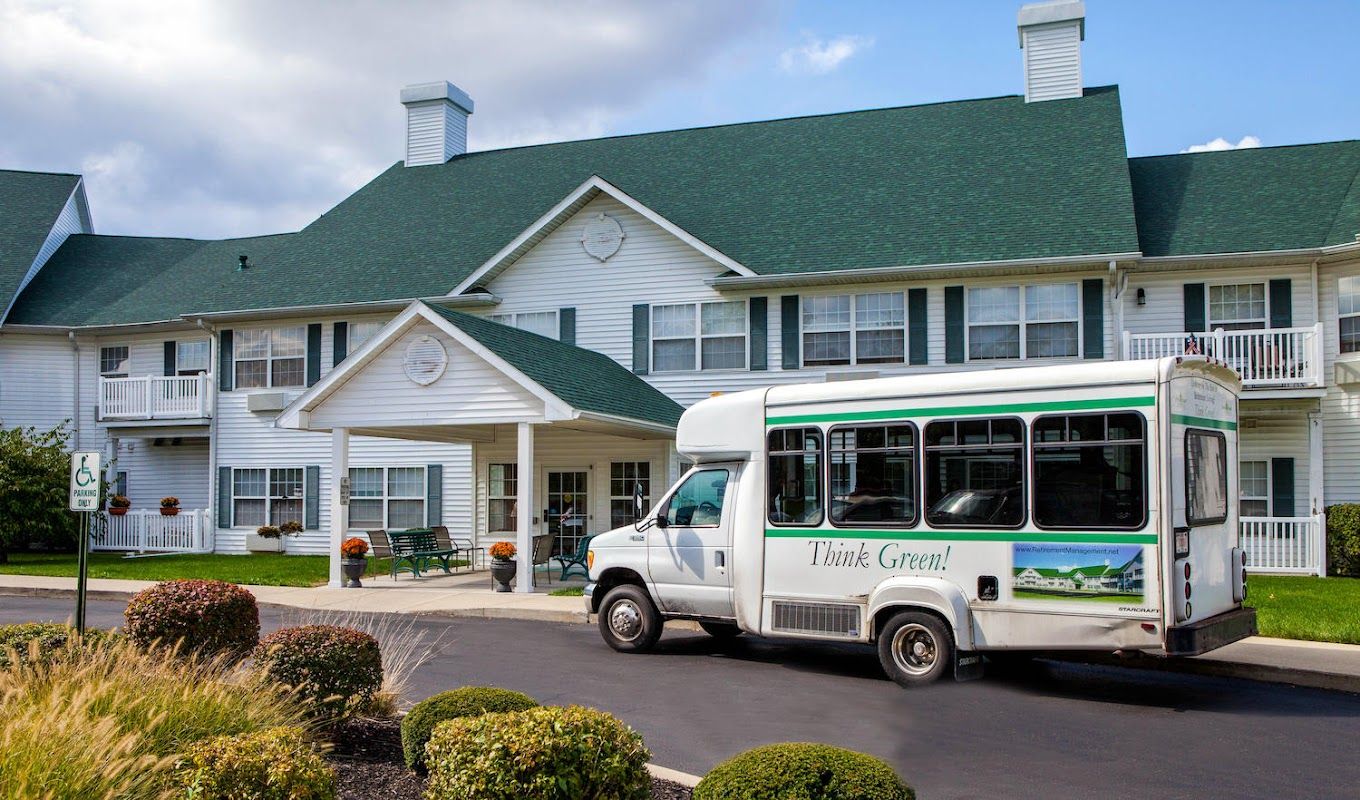 Exterior view of Northwood Manor with facility shuttle