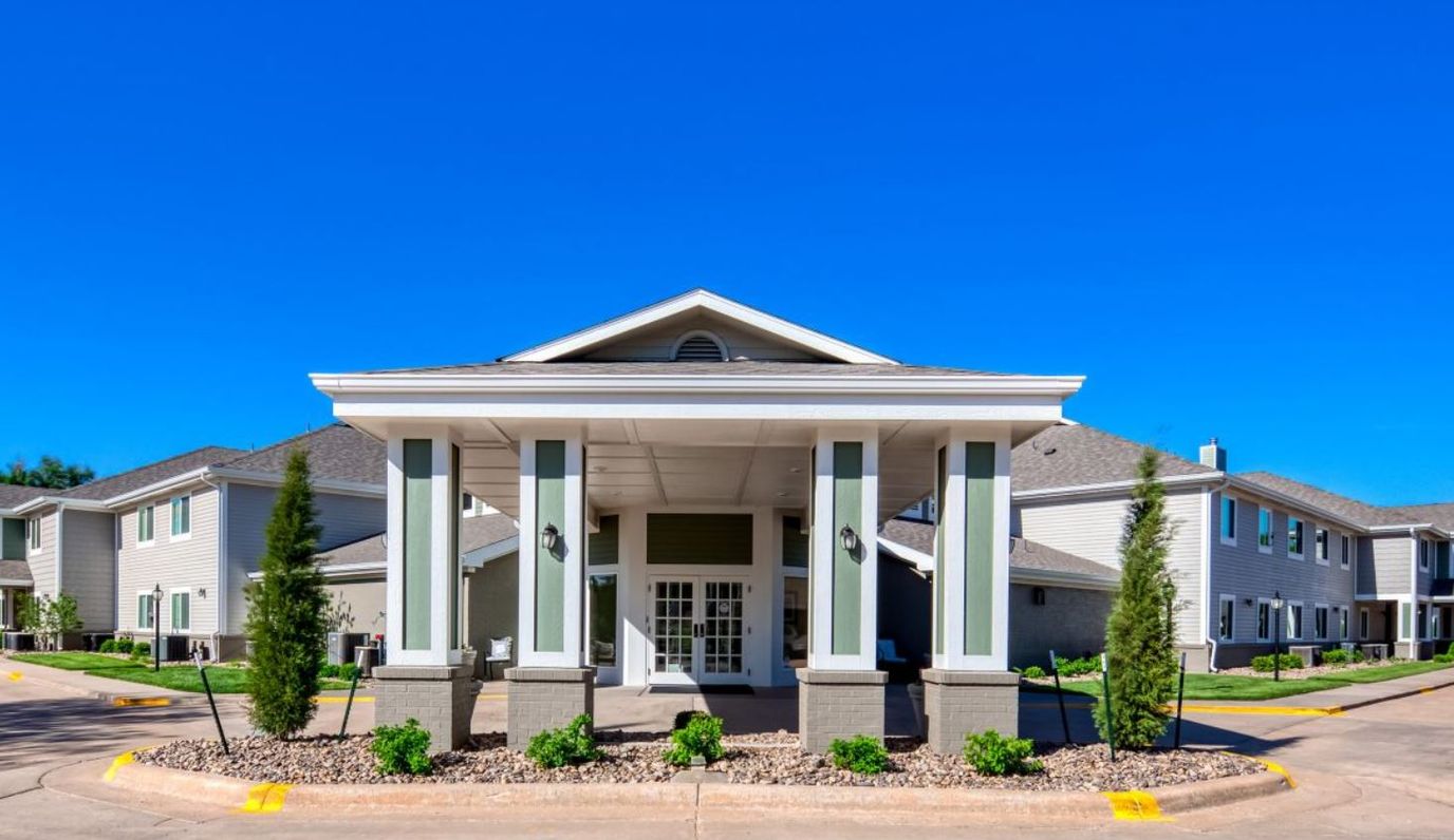 Entrance of Parkwood Village with covered walkways