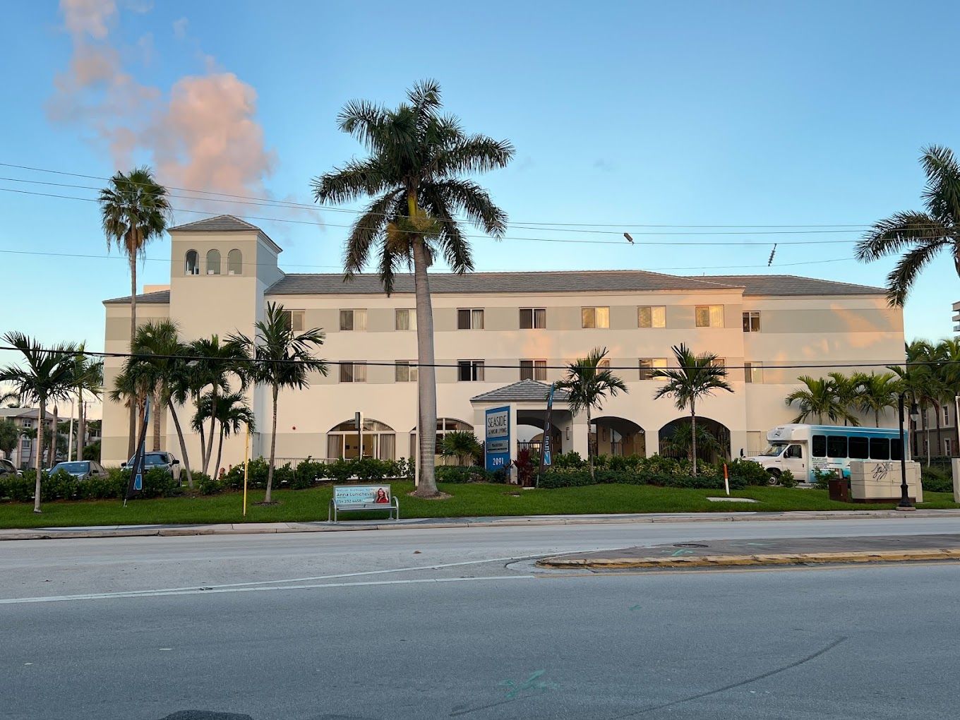 Exterior view of Seaside Hallandale Beach with palm trees