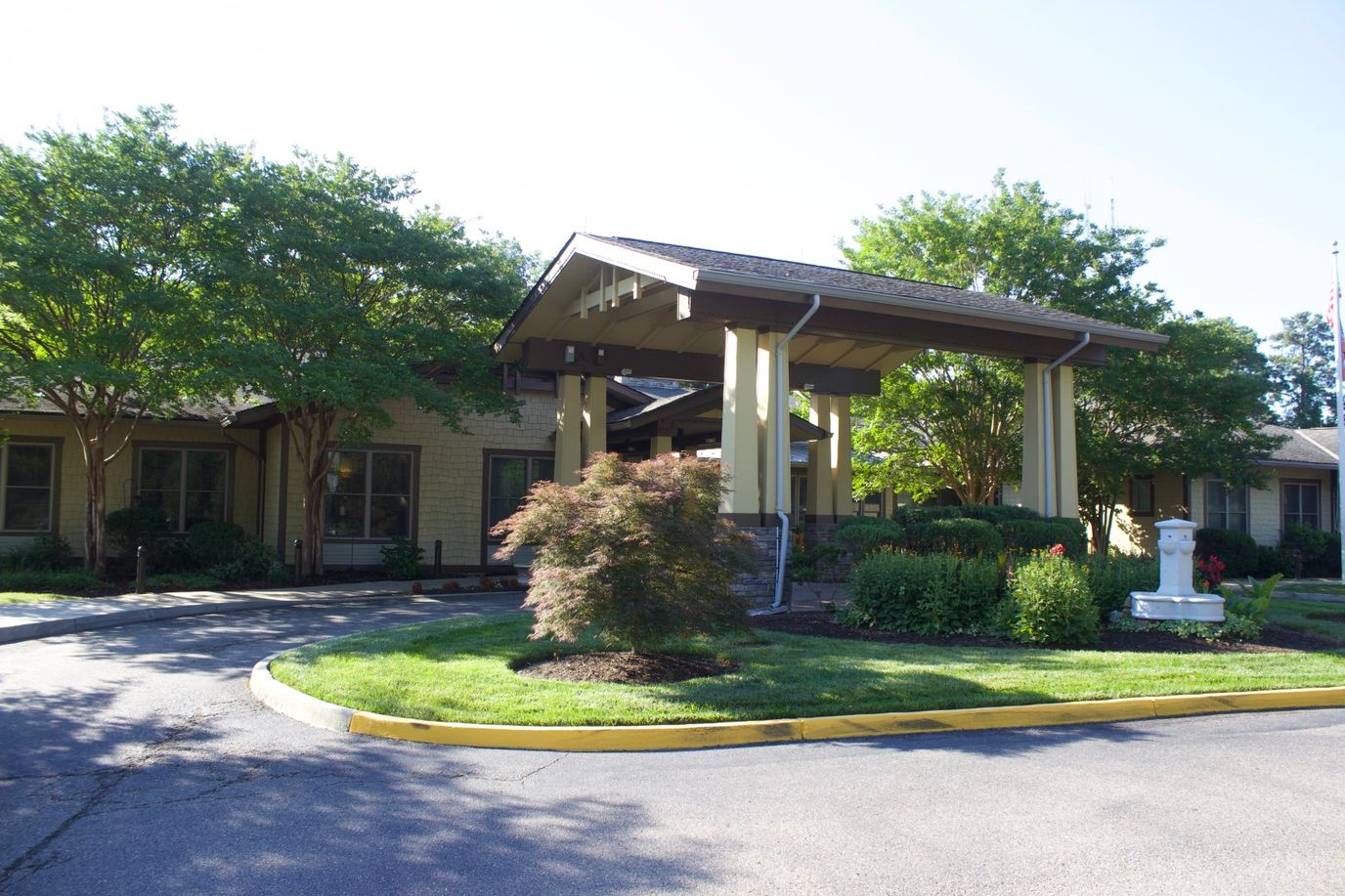 Exterior view of Sunrise at Bon Air with landscaped gardens