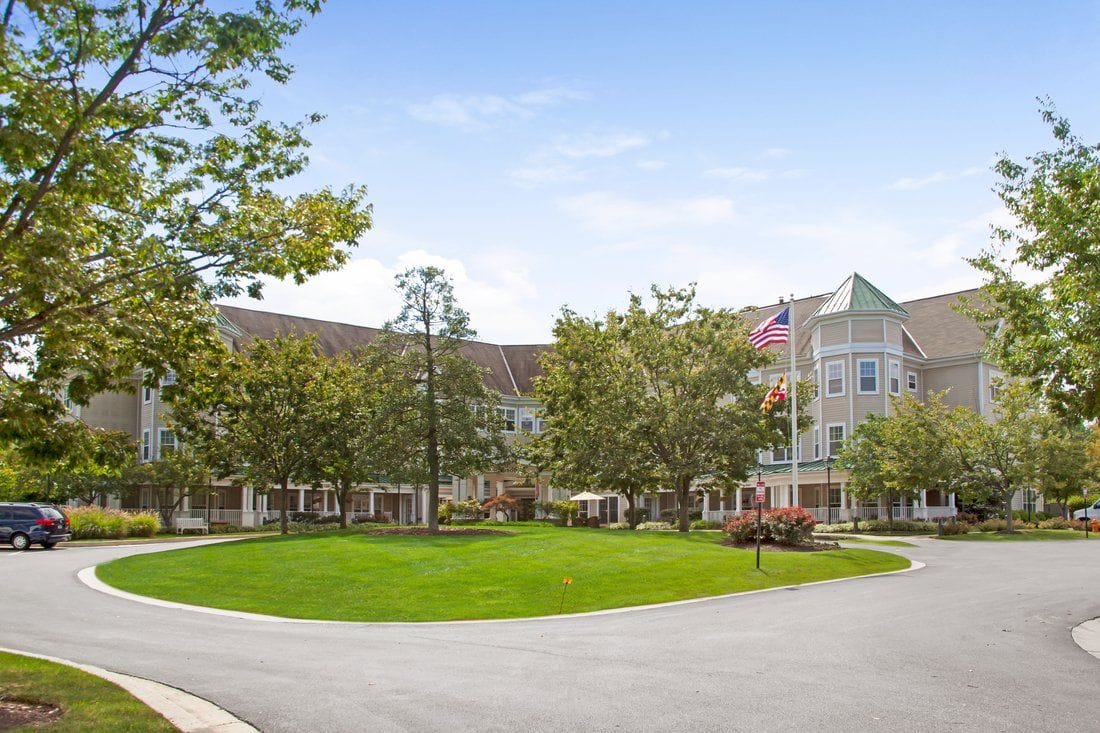 Exterior view of Sunrise of Columbia with landscaped surroundings