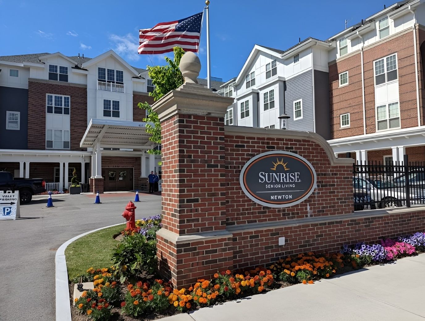 Exterior view of Sunrise Senior Living facility entrance