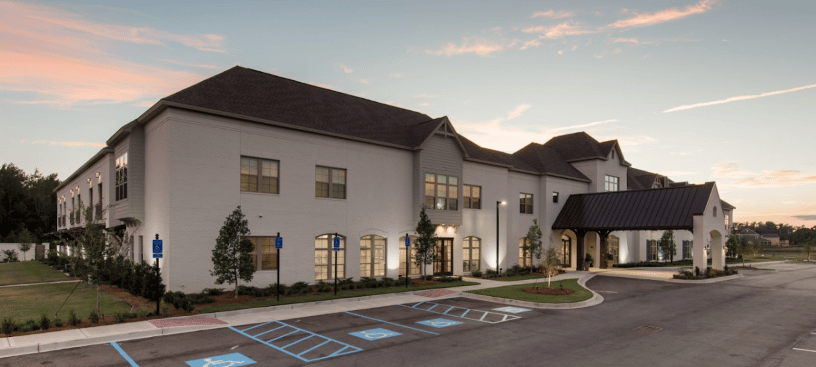 Exterior view of The Blake at Carnes Crossroads at sunset