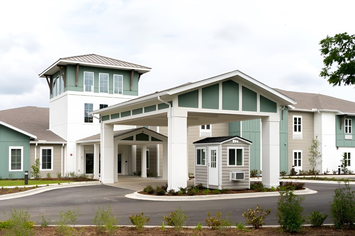 Building exterior with entrance and landscaping