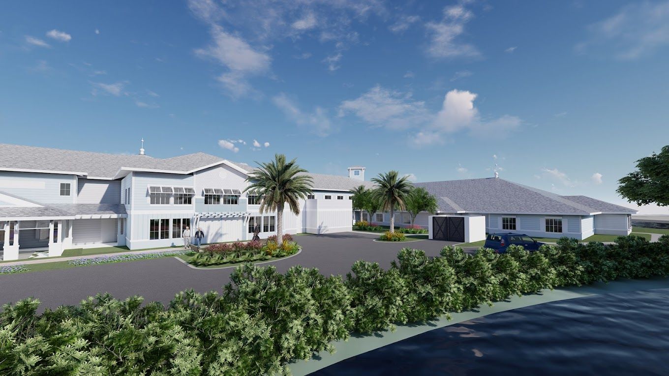 Exterior view of a senior living facility with landscaping