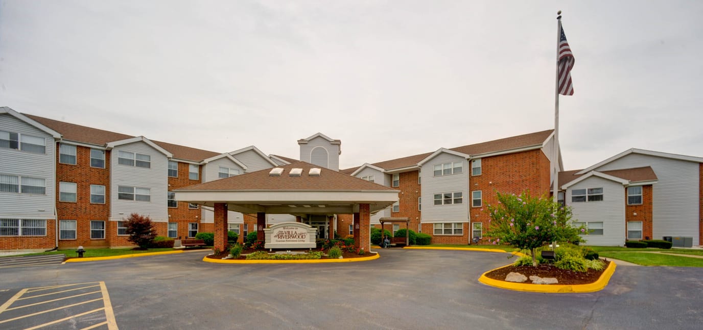Exterior view of The Villa at Riverwood with entrance canopy