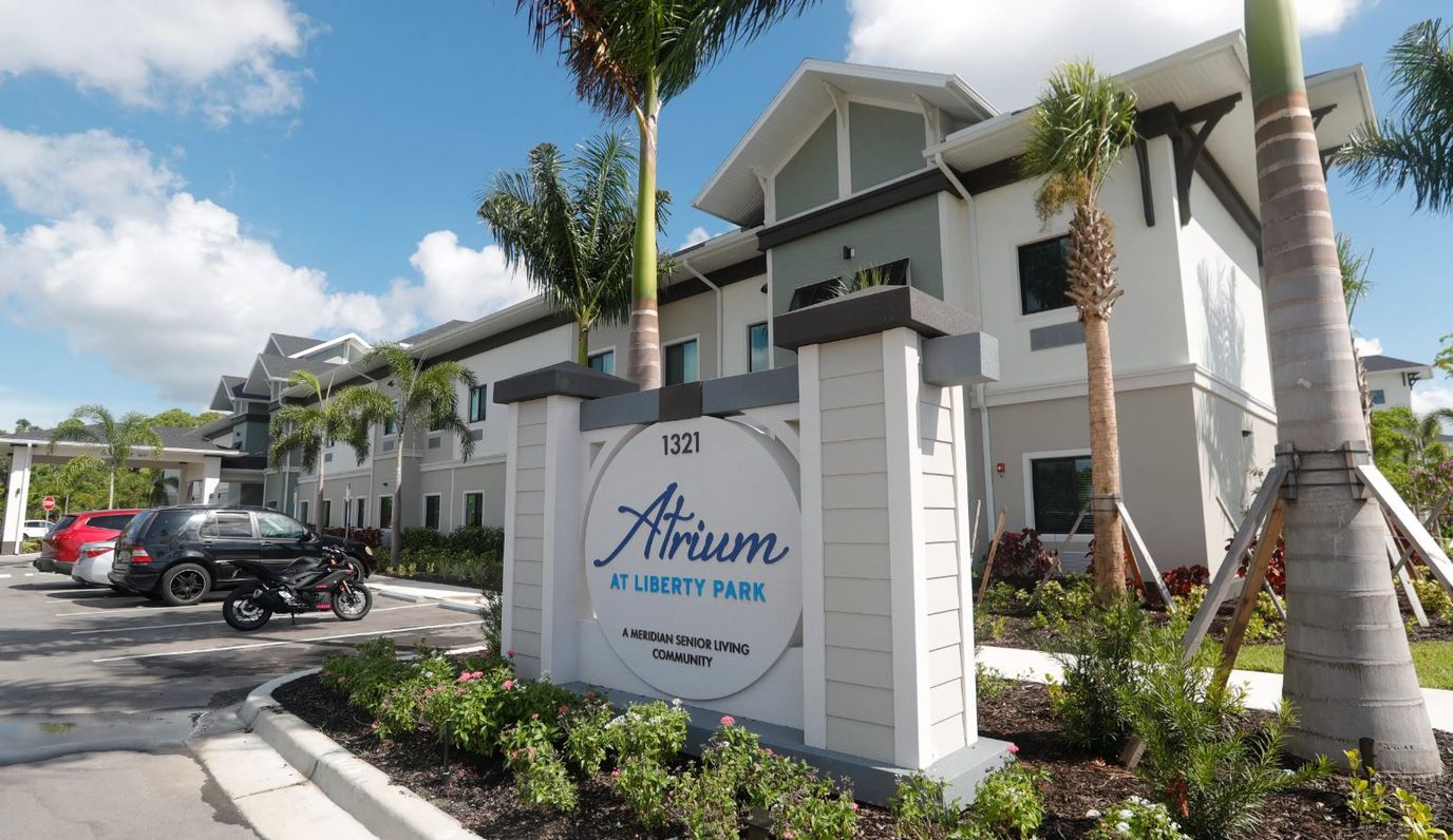 Exterior view of Atrium at Liberty Park entrance sign