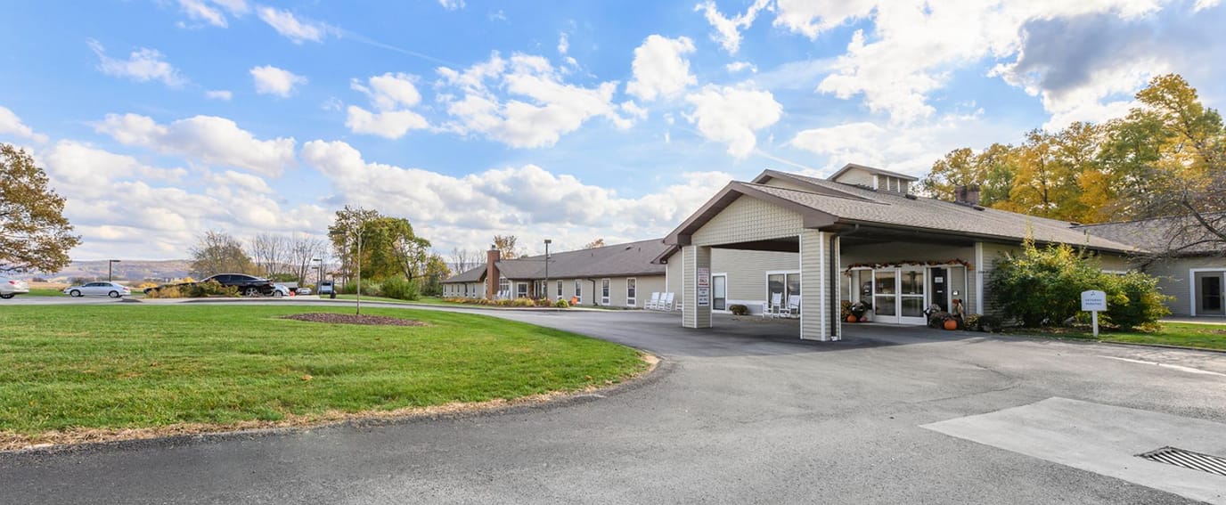 Exterior view of Brookdale Latrobe facility with landscaping