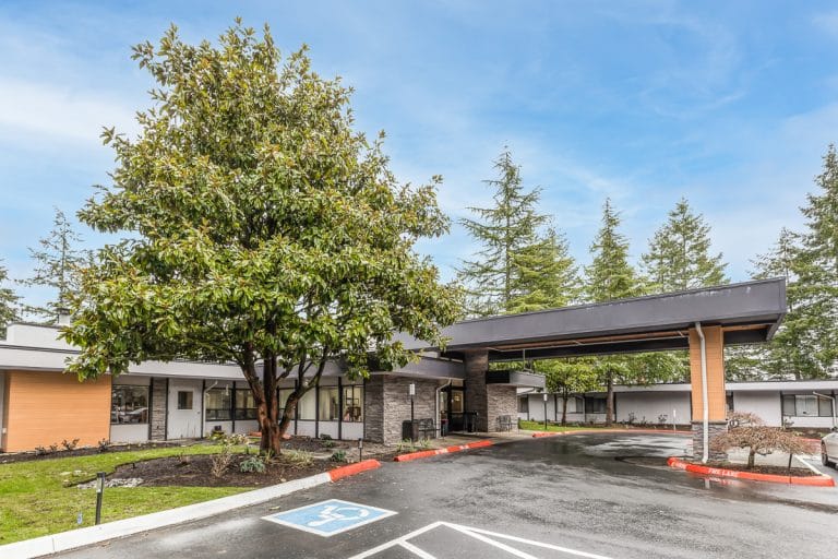 Exterior view of the facility entrance and landscaping