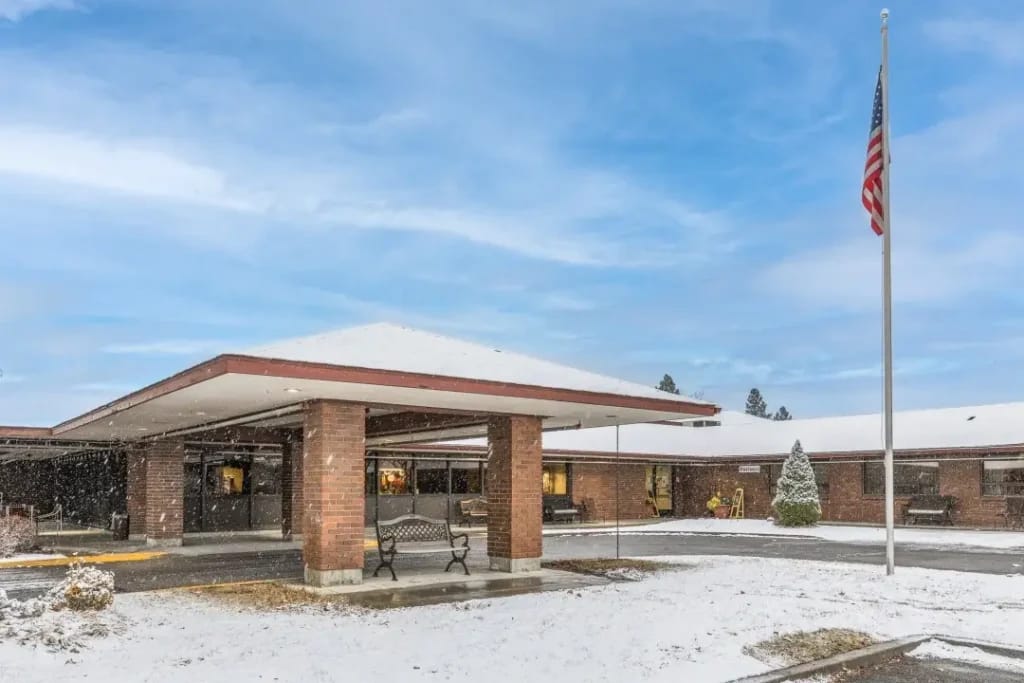 Exterior view of the Ivy Court Skilled Nursing facility in winter