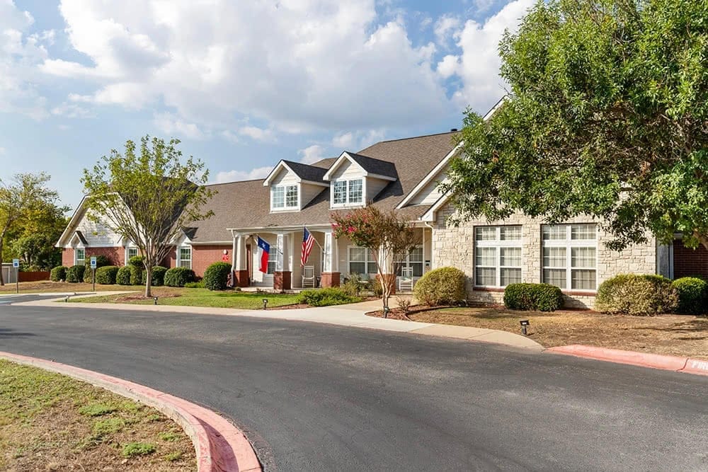 Exterior view of Brookdale Kerrville with entrance and landscaping