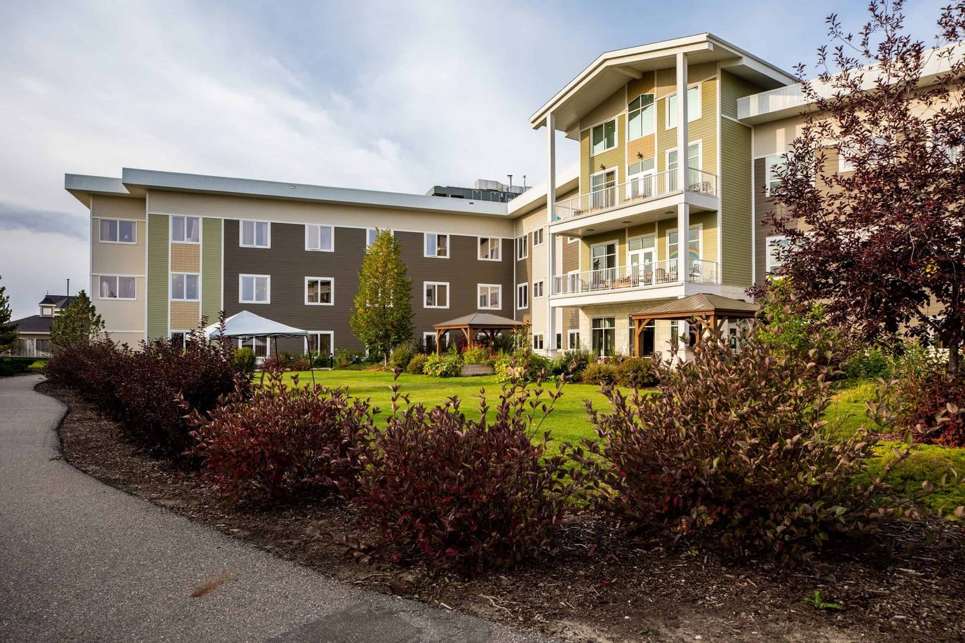 Exterior view of Legacy Lodge with landscaped gardens