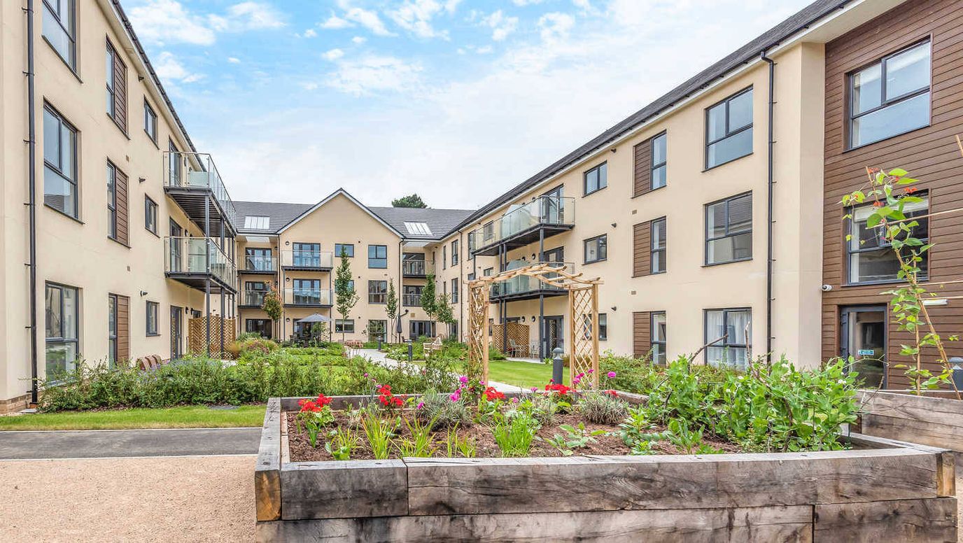 Outdoor courtyard with landscaping and building architecture
