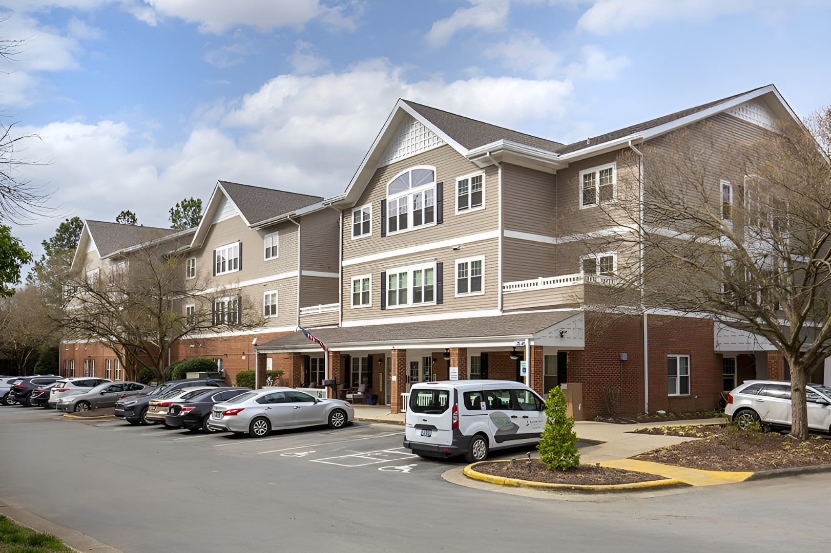 Exterior view of Brookdale Meadowmont with parking lot