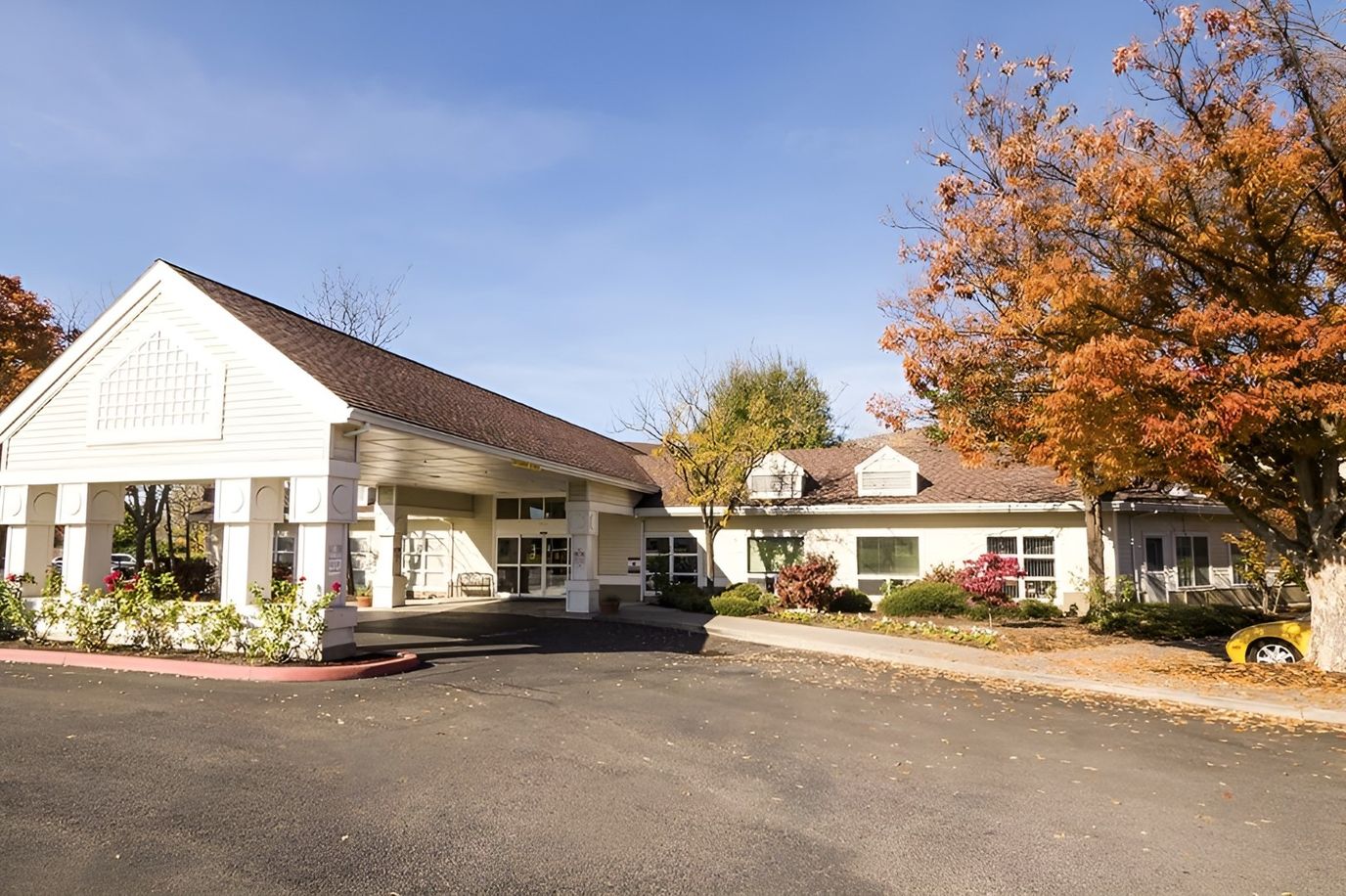 Exterior view of Brookdale Medford facility in autumn