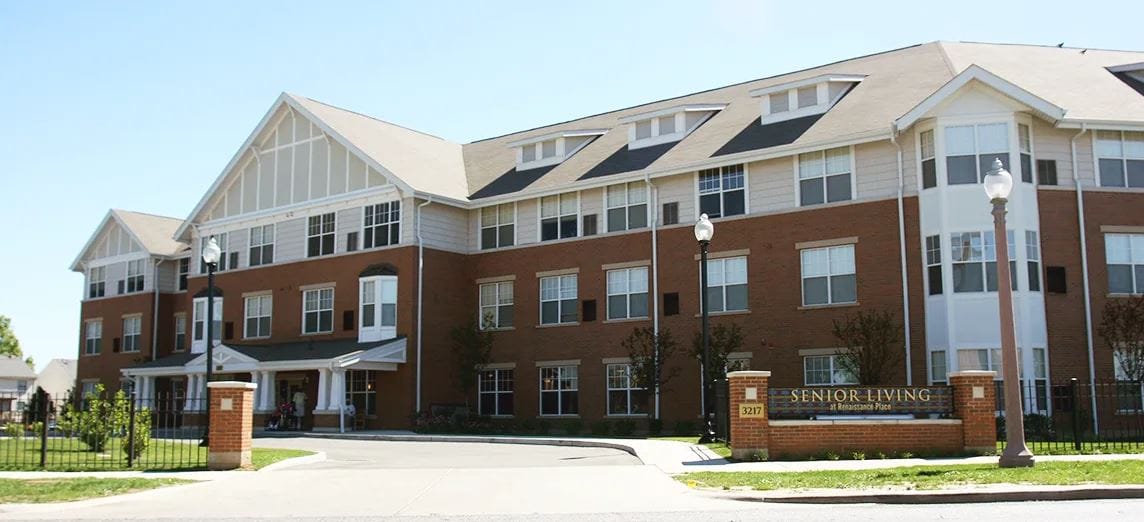 Exterior view of Senior Living facility with trees