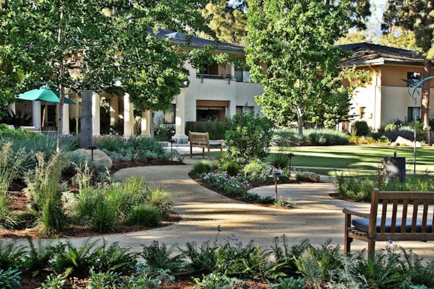 Beautiful landscaped garden with pathways and benches