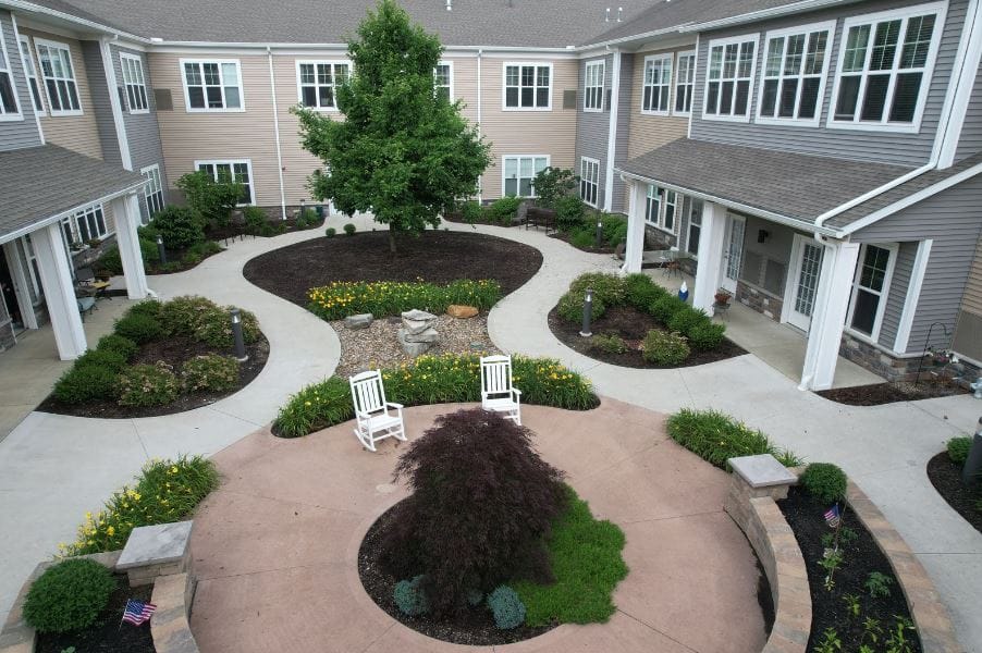 Community garden area with seating and landscaping