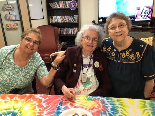 Residents enjoying time together in a vibrant common area