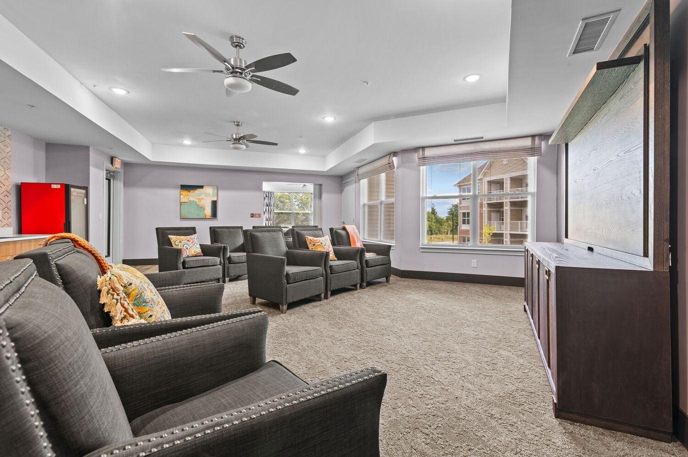 Cozy common area with seating and windows