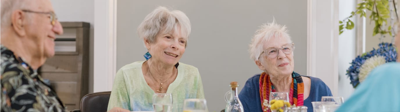 Residents enjoying a conversation in a common area