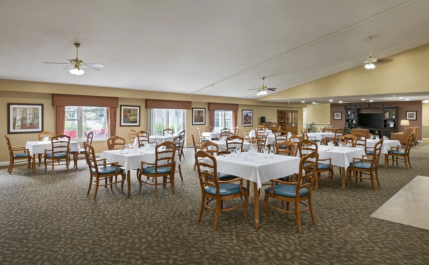 Bright dining room with neatly set tables