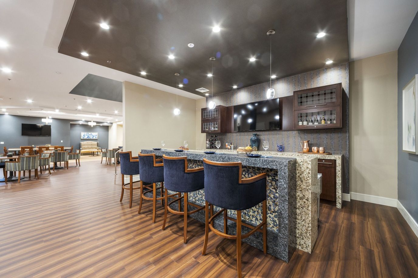 Common area featuring a bar with seating