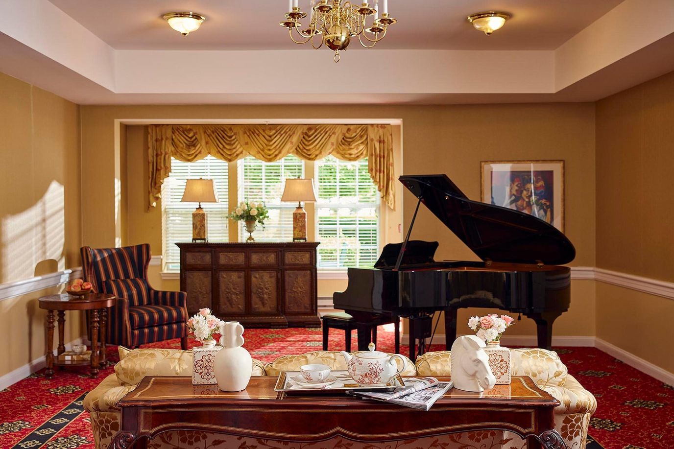 Bright common area with a piano and elegant decor
