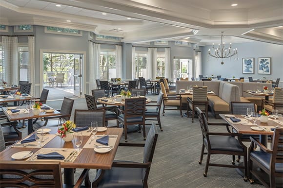 Dining area with tables set for a meal