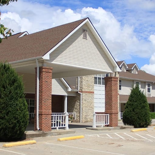 Vintage Park at Kansas, assisted living — Senior living facility entrance with landscaped surroundings