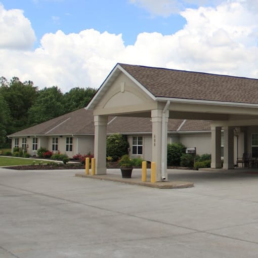 Vintage Park at Kansas, assisted living — Senior living facility entrance with landscaped gardens