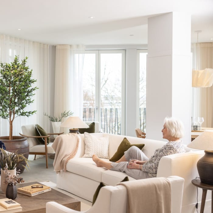 A resident enjoying a cozy common area.