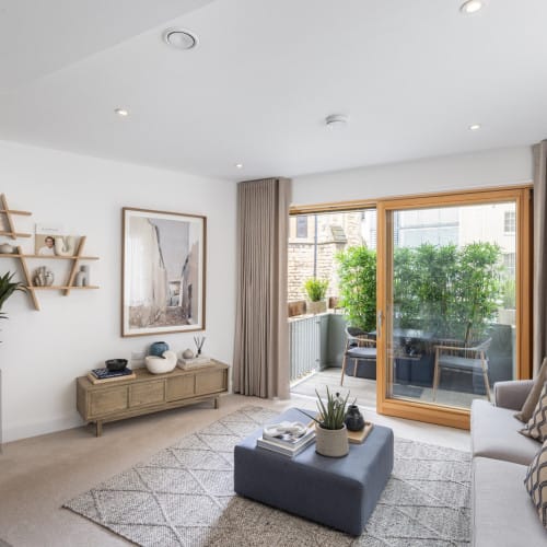Cozy interior lounge area with a balcony
