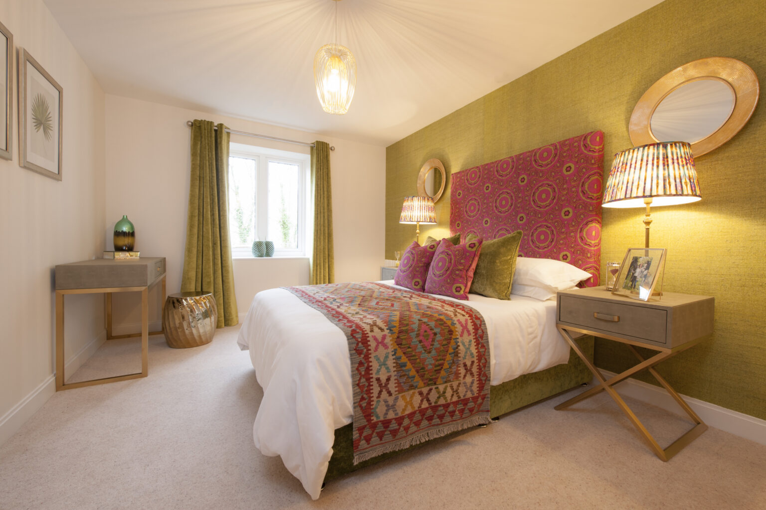 Cozy and well-decorated bedroom with colorful accents.
