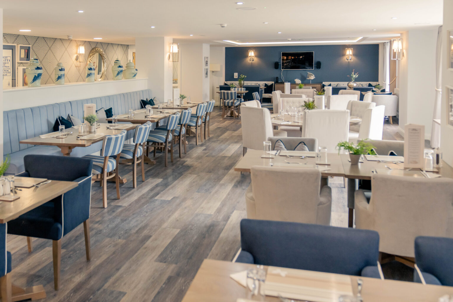 Stylish dining room with tables and chairs