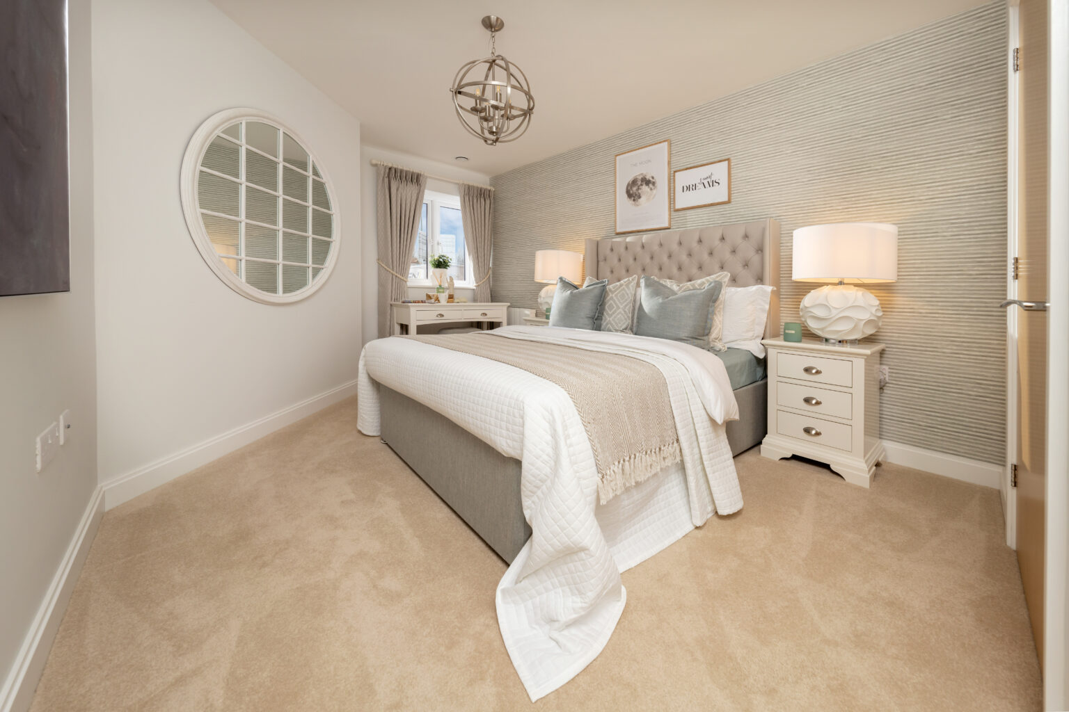 Stylish bedroom interior with soft textures and lighting.