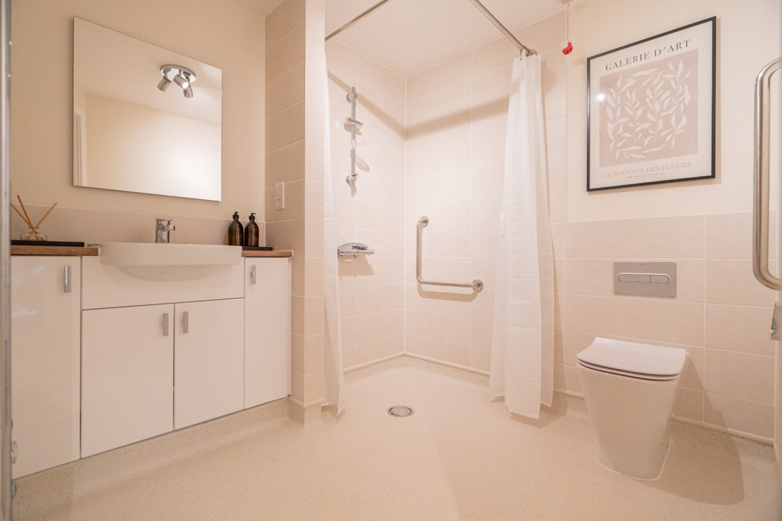 Modern accessible bathroom with shower facilities.